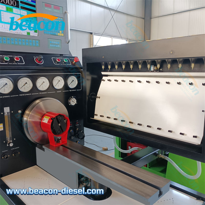 Рабочая зона стенда BC4000 с массивной чугунной станиной, соединительной муфтой и поддоном для сбора топлива